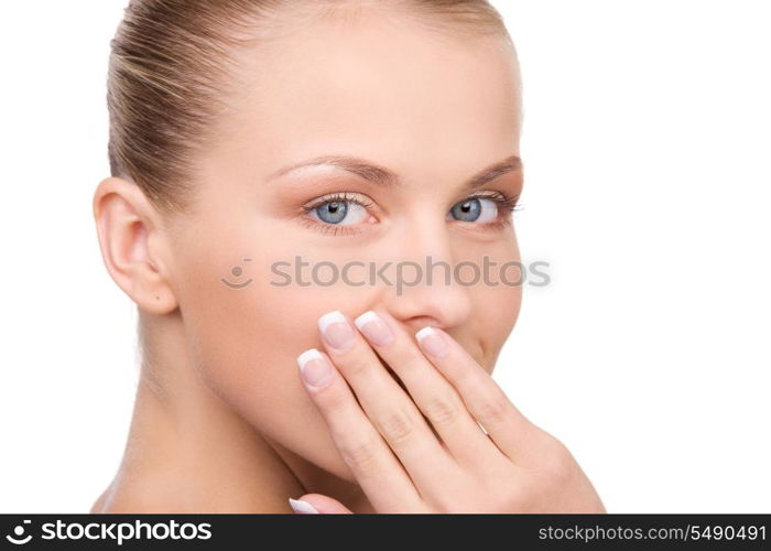 bright picture of teenage girl with hand over mouth