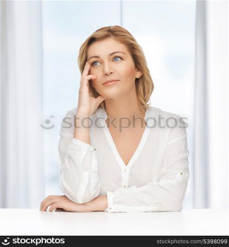 bright picture of thoughtful woman in casual clothes