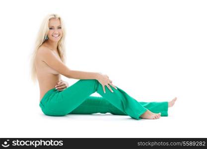 bright picture of topless blonde in green jeans