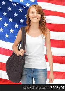 bright picture of travelling student with bag over american flag