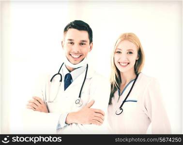 bright picture of two young attractive doctors