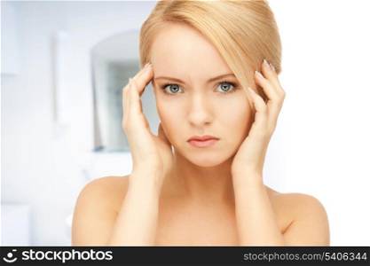 bright picture of unhappy woman in bathroom