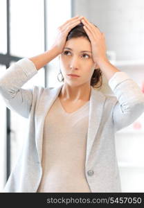 bright picture of unhappy woman over white