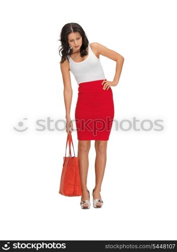 bright picture of unhappy woman with heavy bag