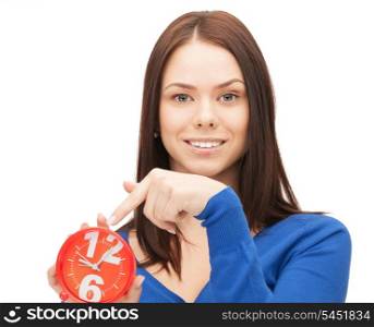 bright picture of woman holding alarm clock