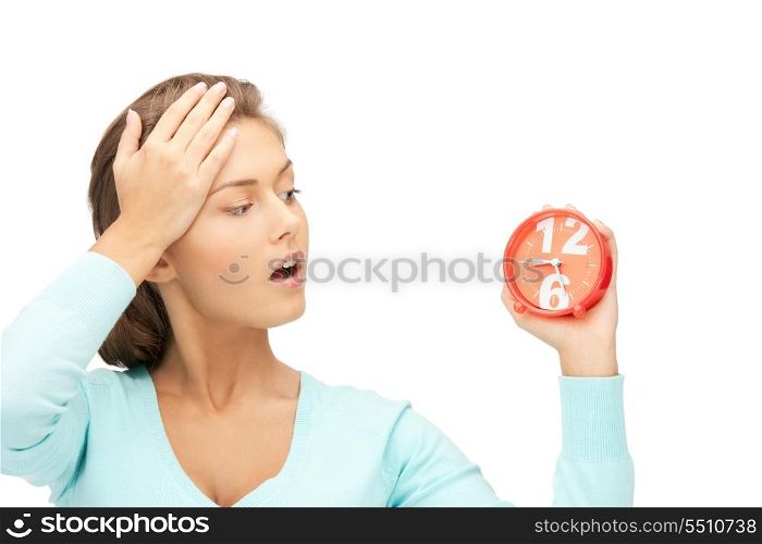 bright picture of woman holding alarm clock