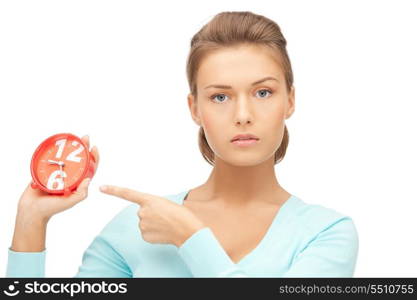 bright picture of woman holding alarm clock