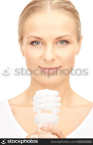 bright picture of woman holding energy saving bulb