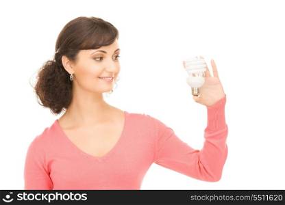 bright picture of woman holding energy saving bulb