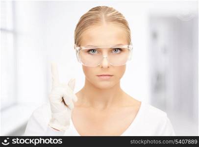 bright picture of woman in protective glasses and gloves