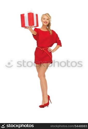 bright picture of woman in red dress with present