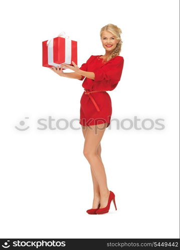 bright picture of woman in red dress with present