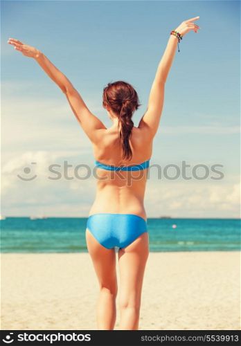 bright picture of woman on the beach