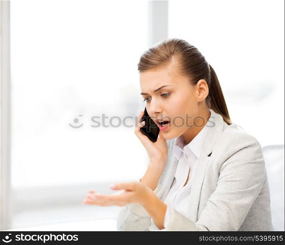 bright picture of woman shouting into smartphone