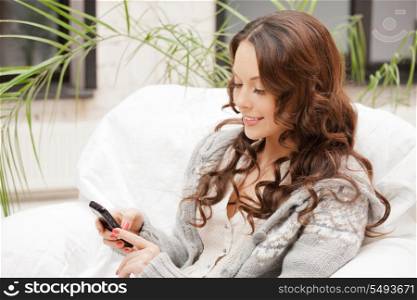 bright picture of woman with cell phone