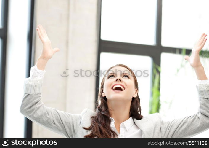 bright picture of woman with expression of tryumph