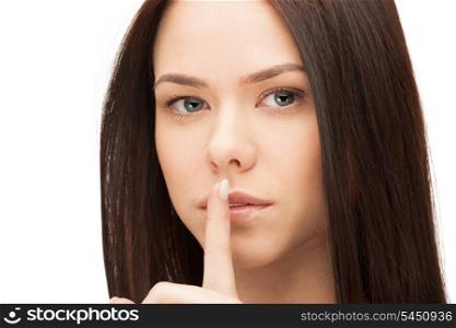 bright picture of woman with finger on lips
