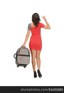 bright picture of woman with suitcase waving hand