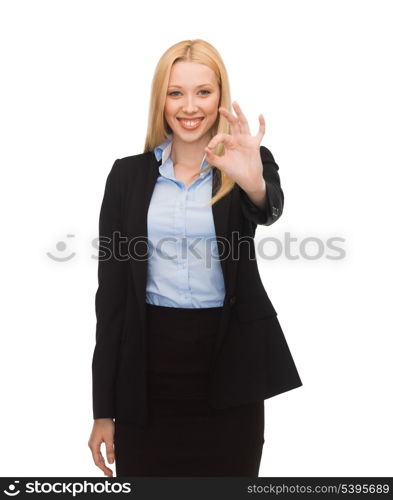 bright picture of young businesswoman showing ok sign