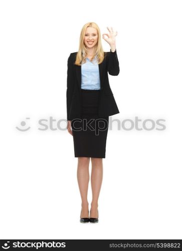 bright picture of young businesswoman showing ok sign
