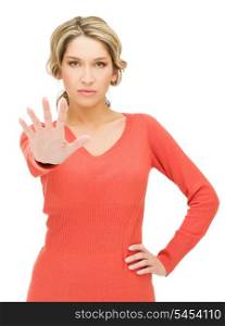 bright picture of young woman making stop gesture..