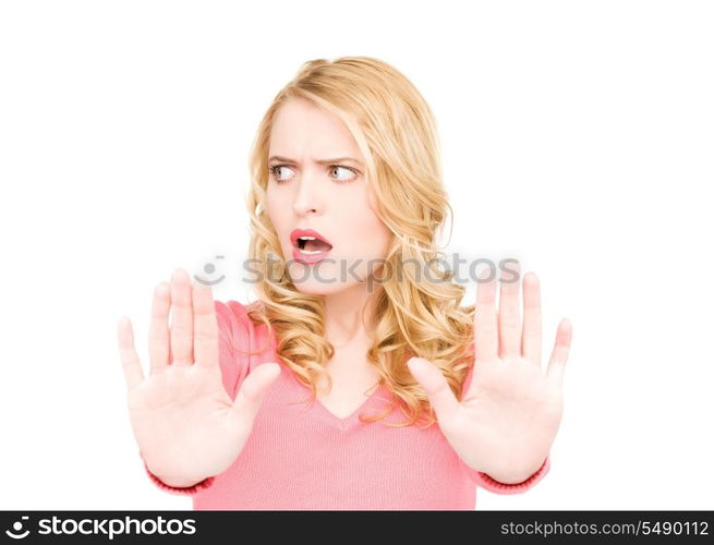 bright picture of young woman making stop gesture