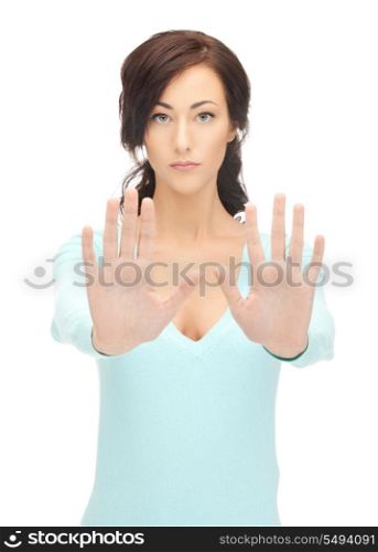 bright picture of young woman making stop gesture