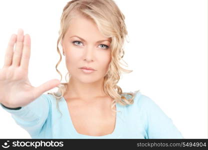 bright picture of young woman making stop gesture