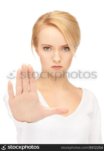 bright picture of young woman making stop gesture