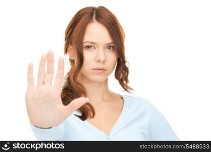 bright picture of young woman making stop gesture&#xA;
