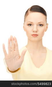 bright picture of young woman making stop gesture&#xA;