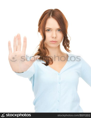 bright picture of young woman making stop gesture&#xA;