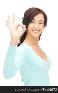 bright picture of young woman showing ok sign