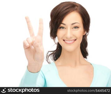 bright picture of young woman showing victory sign