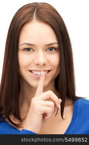 bright picture of young woman with finger on lips