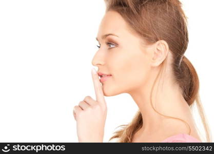 bright picture of young woman with finger on lips