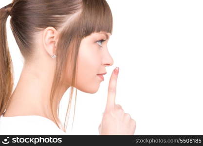 bright picture of young woman with finger on lips