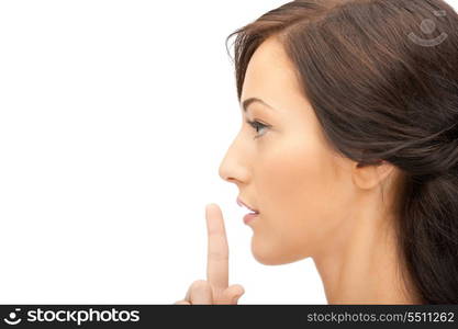 bright picture of young woman with finger on lips