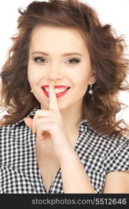 bright picture of young woman with finger on lips