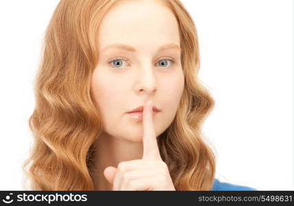 bright picture of young woman with finger on lips&#xA;