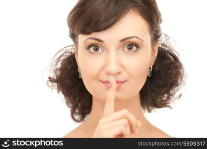 bright picture of young woman with finger on lips&#xA;