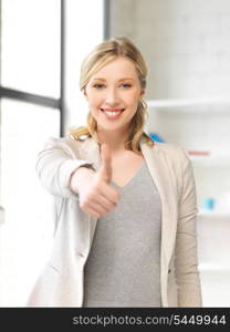 bright picture of young woman with thumbs up