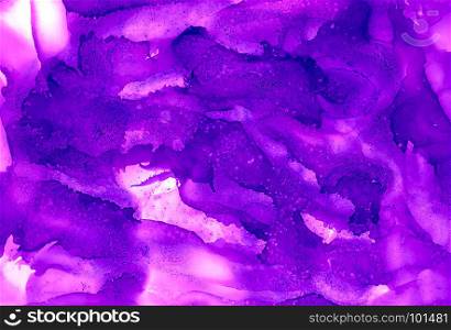 Bright purple paint uneven splashes textured.Colorful background hand drawn with bright inks and watercolor paints. Color splashes and splatters create uneven artistic modern design.