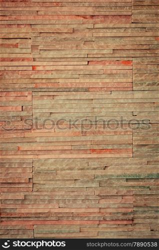 Bright red brown background of brick stone wall texture pattern layout