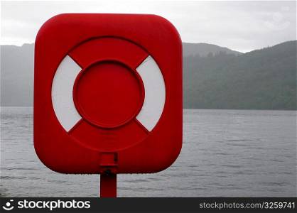 Bright red mooring marker, Loch Ness, Scotland.