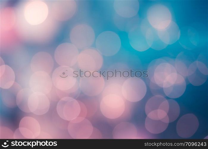 Bright round bokeh on vivid pink and blue background