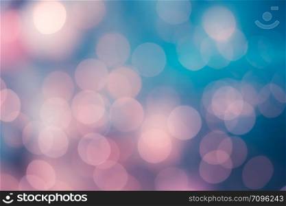 Bright round bokeh on vivid pink and blue background