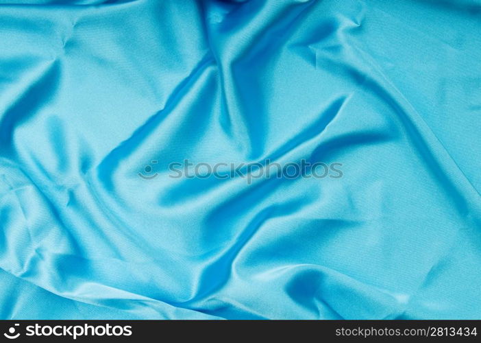 Bright satin fabric folded to be used as background