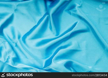 Bright satin fabric folded to be used as background