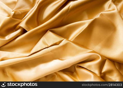 Bright satin fabric folded to be used as background